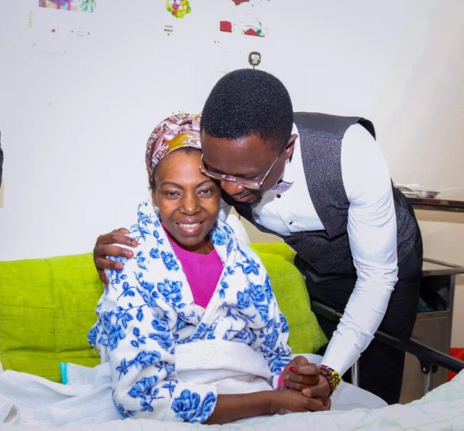 CS Namwamba hails Kasavuli as a towering figure in Kenyan journalism as he visits her in hospital